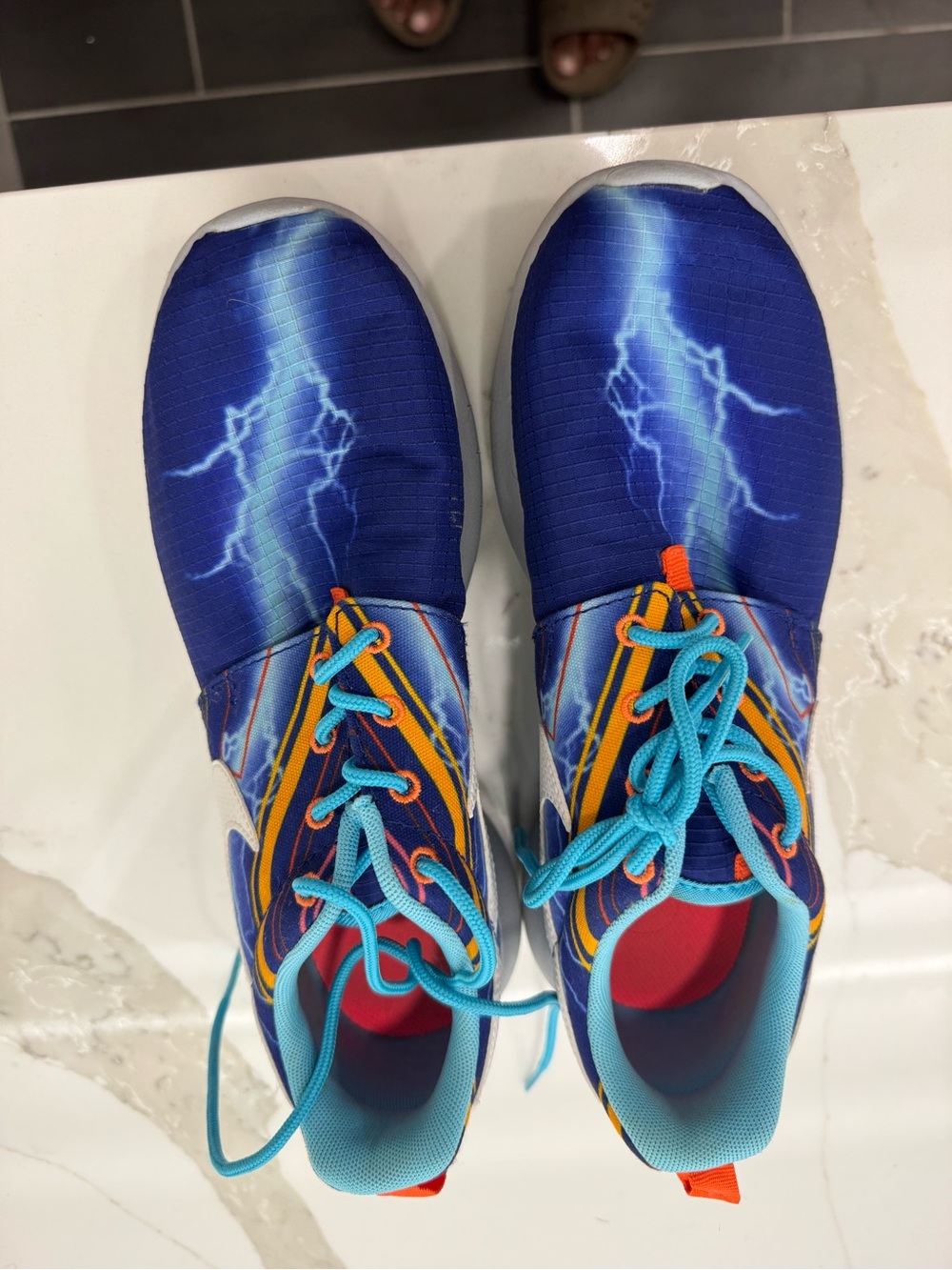 Nike Blue Lightning Graphic Athletic Sneakers with Orange & Turquoise Accents